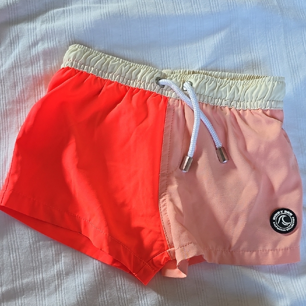 Vibrant Kids Swim Trunks in Coral and Peach
